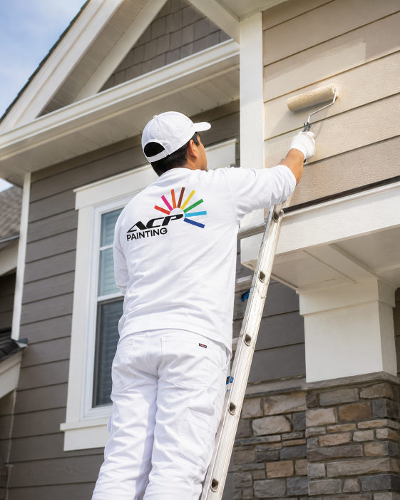 ACP Painting crew member at work